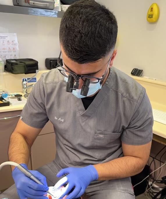 Dentist Dr. Asif at work.